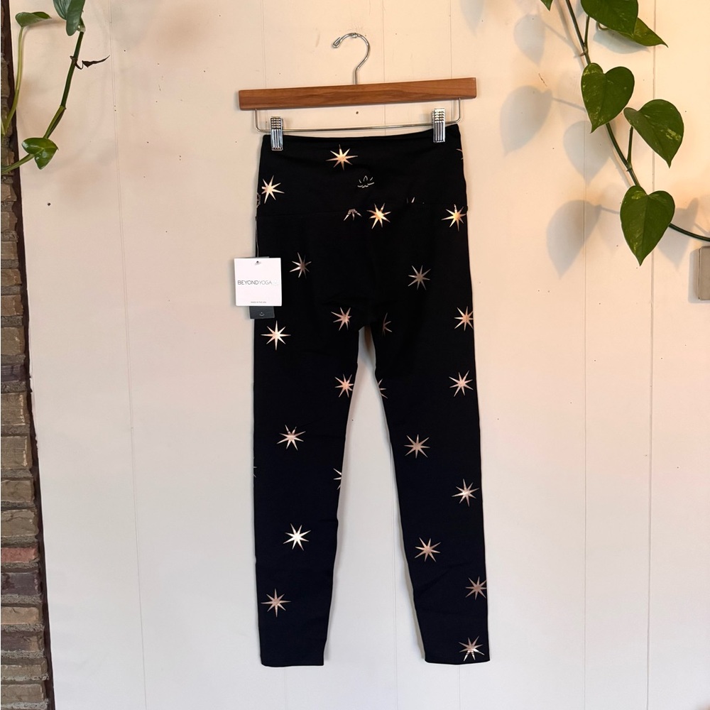 Beyond Yoga Black Leggings with Rose Star Motif